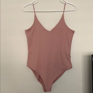 Pink body suit NEVER WORN!